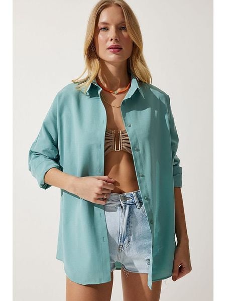 Happiness Istanbul Bluzka "Happiness Istanbul" w kolorze turkusowym rozmiar: 36. Niebieskie bluzki Happiness Istanbul, bez wzorów, z bawełny, bez kołnierzyka, bez ramiączek. Za 52,30 zł.