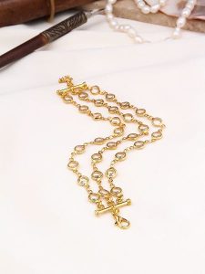 Pierres de Jade Pozłacana bransoletka z kryształami rozmiar: onesize. Brązowe bransoletki Pierres de Jade, z kryształem, pozłacane. Za 34,99 zł.