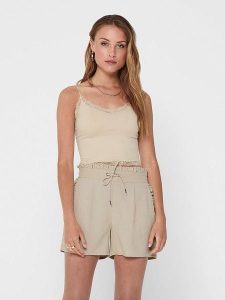 ONLY Top w kolorze beżowym rozmiar: S/M. Brązowe topy ONLY, m, bez wzorów, z koronki, bez kołnierzyka, bez ramiączek. Za 32,90 zł.