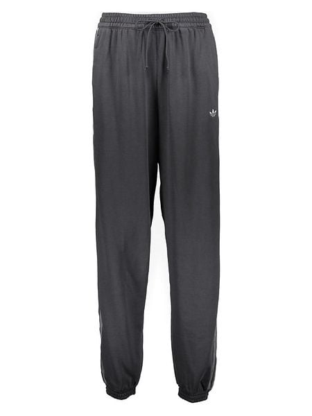 Adidas Spodnie dresowe w kolorze czarnym rozmiar: XL. Czarne spodnie dresowe ADIDAS, xl, bez wzorów, z dresówki. Za 109,00 zł.