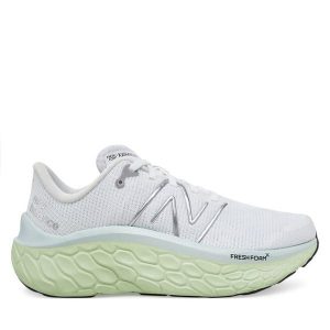 Buty do biegania New Balance. Białe buty sportowe New Balance, bez wzorów, bez zapięcia, do biegania. Za 369,99 zł.