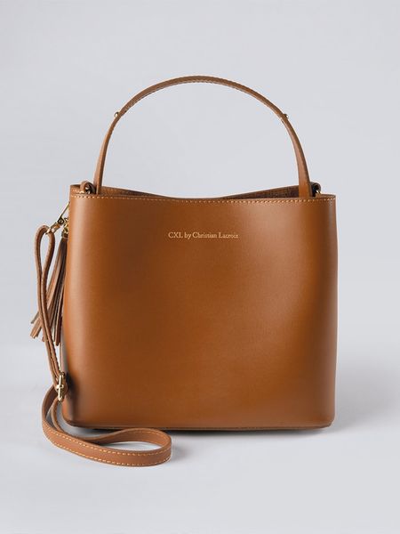 CXL by Christian Lacroix Skórzana torebka w kolorze jasnobrązowym - 22 x 27 x 13 cm rozmiar: onesize. Brązowe torebki klasyczne CXL by Christian Lacroix, bez wzorów, z materiału, przez ramię, bez dodatków. Za 493,45 zł.