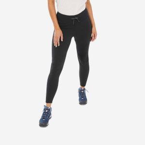 Legginsy turystyczne damskie Quechua NH100. Czarne legginsy QUECHUA, bez wzorów, z elastanu, z podwyższonym stanem. Za 99,99 zł.