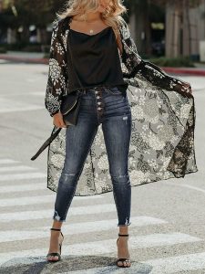 Milan Kiss Kimono w kolorze czarnym rozmiar: XL. Czarne swetry oversize Milan Kiss, xl, bez wzorów, bez ramiączek. Za 122,96 zł.