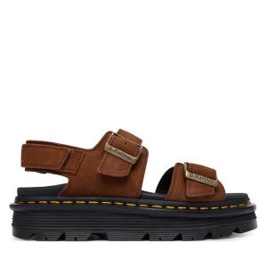 Sandały Dr. Martens. Brązowe sandały Dr. Martens, bez wzorów, bez obcasa, na płaskiej podeszwie, bez zapięcia. Za 543,99 zł.