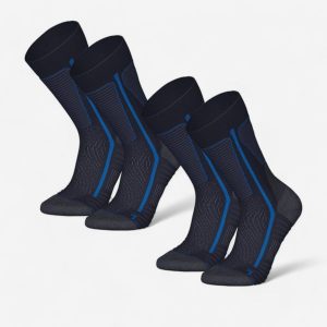 Skarpety turystyczne SH500 Mountain Mid. Niebieskie skarpetki QUECHUA, bez wzorów, z elastanu. Za 84,99 zł.