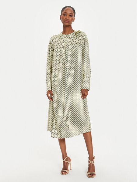 Tommy Hilfiger Sukienka koszulowa WW0WW42318 Żółty Relaxed Fit. Żółte kombinezony TOMMY HILFIGER, bez wzorów, z wiskozy, bez kołnierzyka, bez ramiączek. Za 449,99 zł.