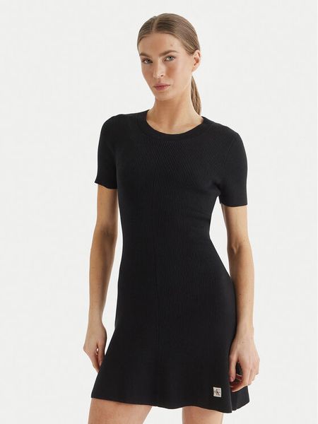 Calvin Klein Jeans Sukienka dzianinowa LV047F325G Czarny Slim Fit. Czarne kombinezony Calvin Klein Jeans, xxl, bez wzorów, z bawełny, bez kołnierzyka, bez ramiączek. Za 489,99 zł.