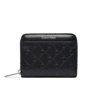 Portfel Calvin Klein. Czarne portfele Calvin Klein, bez wzorów. Za 299,99 zł.