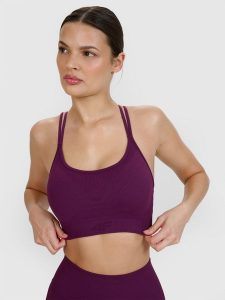 4F Biustonosz do jogi i pilatesu z niskim wsparciem - fioletowy M/L. Fioletowe biustonosze 4f, bez wzorów, z dzianiny. W wyprzedaży za 99,99 zł.