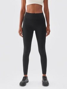 4F Legginsy sportowe w kolorze czarnym rozmiar: M/L. Czarne legginsy 4f, l, bez wzorów, z materiału, z podwyższonym stanem, outdoorowe. Za 79,03 zł.