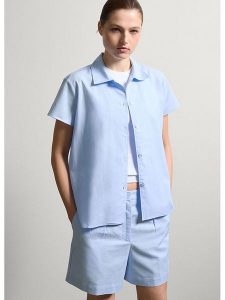 STEFANEL Koszula w kolorze błękitnym rozmiar: S. Niebieskie koszule Stefanel, s, bez wzorów, bez kołnierzyka, bez ramiączek. Za 165,99 zł.