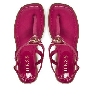 Sandały Guess. Czerwone sandały Guess, z aplikacjami, bez obcasa, na płaskiej podeszwie, bez zapięcia. Za 399,99 zł.