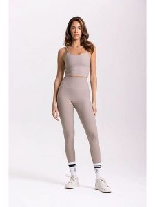Onamaste Legginsy sportowe "Lotus" w kolorze szarobrązowym rozmiar: S/M. Brązowe legginsy Onamaste, m, bez wzorów, z materiału, z podwyższonym stanem, outdoorowe. Za 127,05 zł.