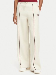 Reebok Spodnie dresowe Oliwia RK25683CCW Beżowy Regular Fit. Brązowe spodnie dresowe Reebok, s, bez wzorów, z dresówki. Za 199,99 zł.