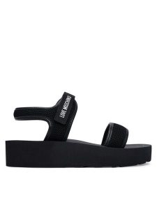 LOVE MOSCHINO Sandały JA16144I0OIQI00A Czarny. Czarne sandały LOVE MOSCHINO, bez wzorów, z materiału, bez obcasa, na płaskiej podeszwie, bez zapięcia. Za 472,99 zł.