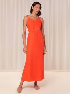 Triumph Sukienka w kolorze pomarańczowym rozmiar: 40. Pomarańczowe sukienki Triumph, bez wzorów, z lyocellu, bez kołnierzyka, bez ramiączek, maxi. Za 118,01 zł.
