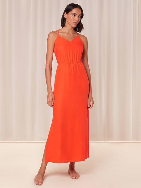 Triumph Sukienka w kolorze pomarańczowym rozmiar: 40. Pomarańczowe sukienki Triumph, bez wzorów, z lyocellu, bez kołnierzyka, bez ramiączek, maxi. Za 132,45 zł.