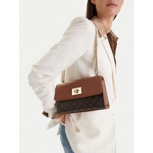 Torebka Nine West. Brązowe torebki wieczorowe Nine West, bez wzorów, bez dodatków. Za 179,99 zł.