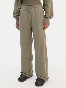 Adidas Spodnie dresowe JM1099 Zielony Regular Fit. Zielone spodnie dresowe ADIDAS, xs, bez wzorów, z bawełny. Za 299,99 zł.