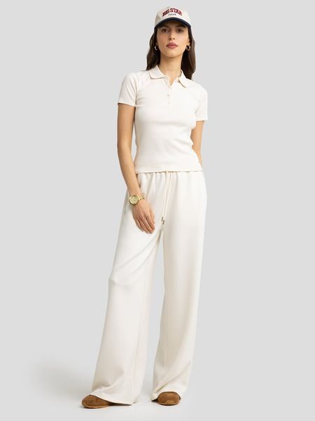 BIG STAR Koszulka polo w kolorze kremowym rozmiar: S. Brązowe bluzki Big Star, s, bez wzorów, z bawełny, retro, bez kołnierzyka, bez ramiączek. Za 79,21 zł.