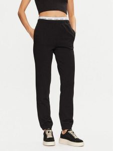 Guess Spodnie dresowe O5RB01 KCO31 Czarny Regular Fit. Czarne spodnie dresowe Guess, xl, z aplikacjami, z bawełny. Za 189,99 zł.