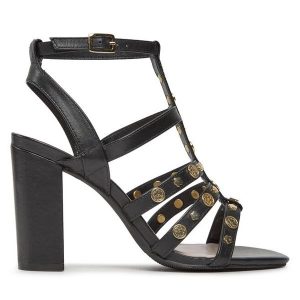 Sandały Ted Baker. Czarne sandały Ted Baker, bez wzorów, bez obcasa, na słupku, bez zapięcia. Za 559,99 zł.