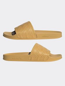 Adidas Klapki w kolorze żółtym rozmiar: 42. Żółte klapki ADIDAS, bez wzorów, z otwartym noskiem, bez obcasa. Za 131,74 zł.