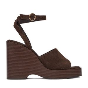 Sandały GINO ROSSI. Brązowe sandały Gino Rossi, bez wzorów, bez obcasa, na koturnie, bez zapięcia. Za 249,99 zł.