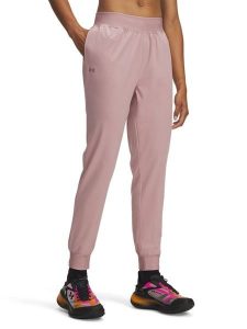 Under Armour Spodnie funkcyjne "Rival" w kolorze jasnoróżowym rozmiar: S. Różowe spodnie dresowe Under Armour, s, bez wzorów, z materiału, outdoorowe. Za 112,36 zł.