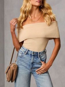 Milan Kiss Koszulka w kolorze beżowym rozmiar: S. Brązowe bluzki Milan Kiss, s, bez wzorów, ze splotem, bez kołnierzyka, bez ramiączek. Za 126,99 zł.