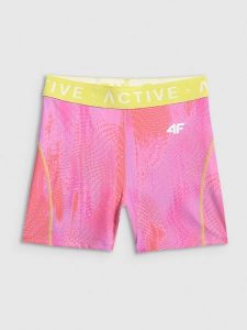 4F Legginsy krótkie treningowe damskie - koralowe M. Pomarańczowe legginsy 4f, bez wzorów, z materiału, z podwyższonym stanem, krótkie. Za 99,99 zł.