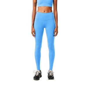 Legginsy treningowe damskie Lacoste. Niebieskie legginsy Lacoste, bez wzorów, z dzianiny, z podwyższonym stanem. Za 257,00 zł.