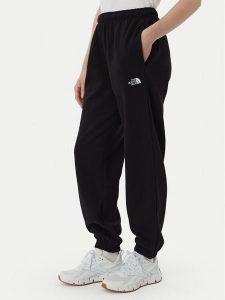 The North Face Spodnie dresowe Evolution Simple Dome NF0A8CWV Czarny Regular Fit. Czarne spodnie dresowe The North Face, l, bez wzorów, z dresówki. Za 279,99 zł.