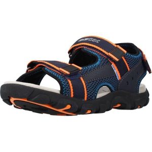 Sandały GEOX JR SANDAL STRADA A Niebieski. Niebieskie sandały Geox, bez wzorów, ze skóry, bez obcasa, bez zapięcia. Za 139,99 zł.
