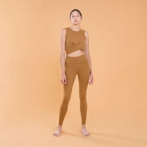 Legginsy do jogi damskie Kimjaly Premium. Brązowe legginsy KIMJALY, bez wzorów, z elastanu. W wyprzedaży za 149,99 zł.
