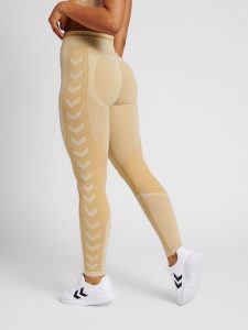 Legginsy damskie Hummel MT Lulu. Brązowe legginsy Hummel, bez wzorów, z dzianiny, z standardowym stanem. Za 196,00 zł.
