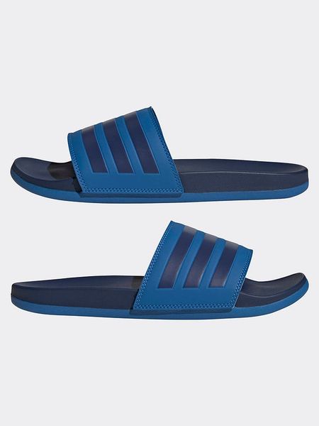 Adidas Klapki w kolorze niebiesko-granatowym rozmiar: 40,5. Niebieskie klapki ADIDAS, bez wzorów, z otwartym noskiem, bez obcasa. Za 122,38 zł.