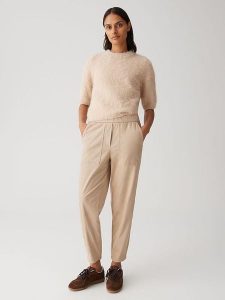 OPUS Spodnie w kolorze karmelowym rozmiar: 44. Brązowe spodnie z wysokim stanem Opus, bez wzorów, z materiału, z podwyższonym stanem. Za 173,99 zł.