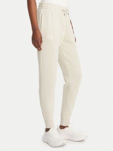 Under Armour Spodnie dresowe UA Icon Fleece 6001537 Beżowy Slim Fit. Brązowe spodnie dresowe Under Armour, s, bez wzorów, z bawełny. Za 249,99 zł.