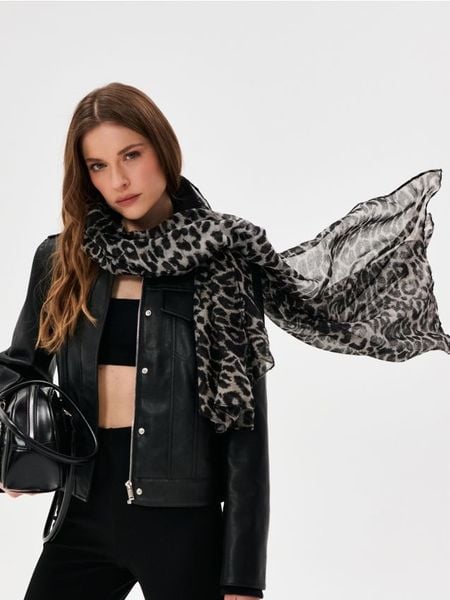 Szalik w panterkę - wielobarwny. Szaliki Sinsay, bez wzorów. Za 29,99 zł.