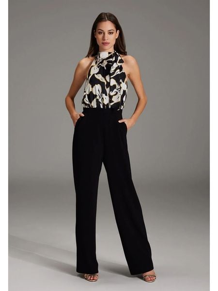 SWING Kombinezon w kolorze czarnym rozmiar: 36. Czarne kombinezony Swing, bez wzorów, bez kołnierzyka, bez ramiączek. Za 279,78 zł.