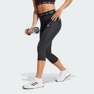 Legginsy capri TECHFIT. Czarne legginsy ADIDAS, bez wzorów, z materiału. Za 179,00 zł.