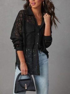 Milan Kiss Bluzka w kolorze czarnym rozmiar: M. Czarne bluzki Milan Kiss, m, bez wzorów, z koronki, bez kołnierzyka, bez ramiączek. Za 152,99 zł.