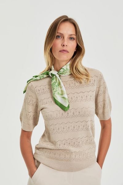 Wzorzysta apaszka zielona. Zielone apaszki i chusty MOODO, bez wzorów, z poliesteru. Za 34,99 zł.