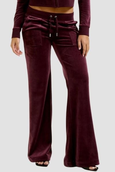 JUICY COUTURE Śliwkowe spodnie dresowe damskie Layla Low Rise, Rozmiar S. Fioletowe spodnie dresowe Juicy Couture, s, bez wzorów, z dresówki. W wyprzedaży za 289,99 zł.