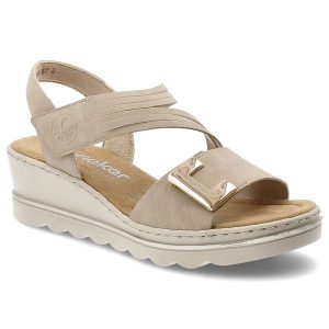 Sandały damskie Rieker, cholewka ze skóry ekologicznej zapinane na rzep fason na koturnie, beżowe, 67410-62. Brązowe sandały Rieker, bez wzorów, ze skóry ekologicznej, bez obcasa, na koturnie, bez zapięcia. Za 319,00 zł.