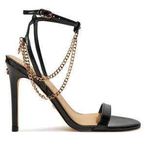 Sandały Guess. Czarne sandały Guess, z aplikacjami, bez obcasa, na szpilce, bez zapięcia. Za 529,99 zł.