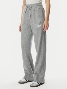 Adidas Spodnie dresowe Essentials IA4439 Szary jasny Loose Fit. Szare spodnie dresowe ADIDAS, l, bez wzorów, z bawełny. Za 299,99 zł.