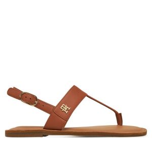 Sandały Tommy Hilfiger. Brązowe sandały TOMMY HILFIGER, bez wzorów, bez obcasa, na płaskiej podeszwie, bez zapięcia. Za 219,99 zł.